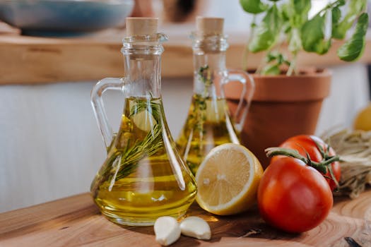 Close-up of fresh ingredients for Italian cooking featuring olive oil and basil.